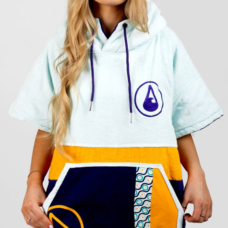 Maniero Poncho Front View Being Warm Stretched Pocket