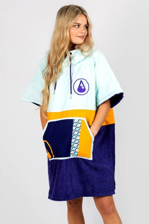 Maniero Poncho Looking Sideways Hands Warm In Pocket