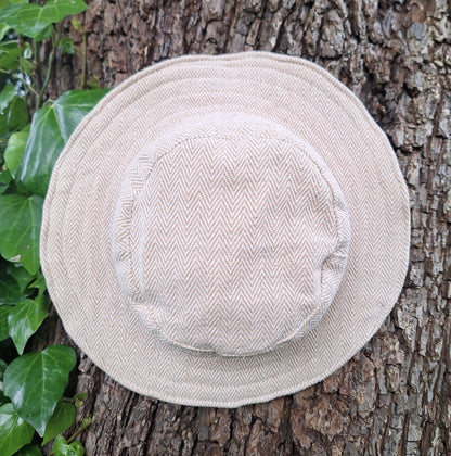 Unisex HERRINGBONE OUTBACK CREAM hat with a flexible, finished and lined brim. Beautiful pure Cotton and Fairtrade.
