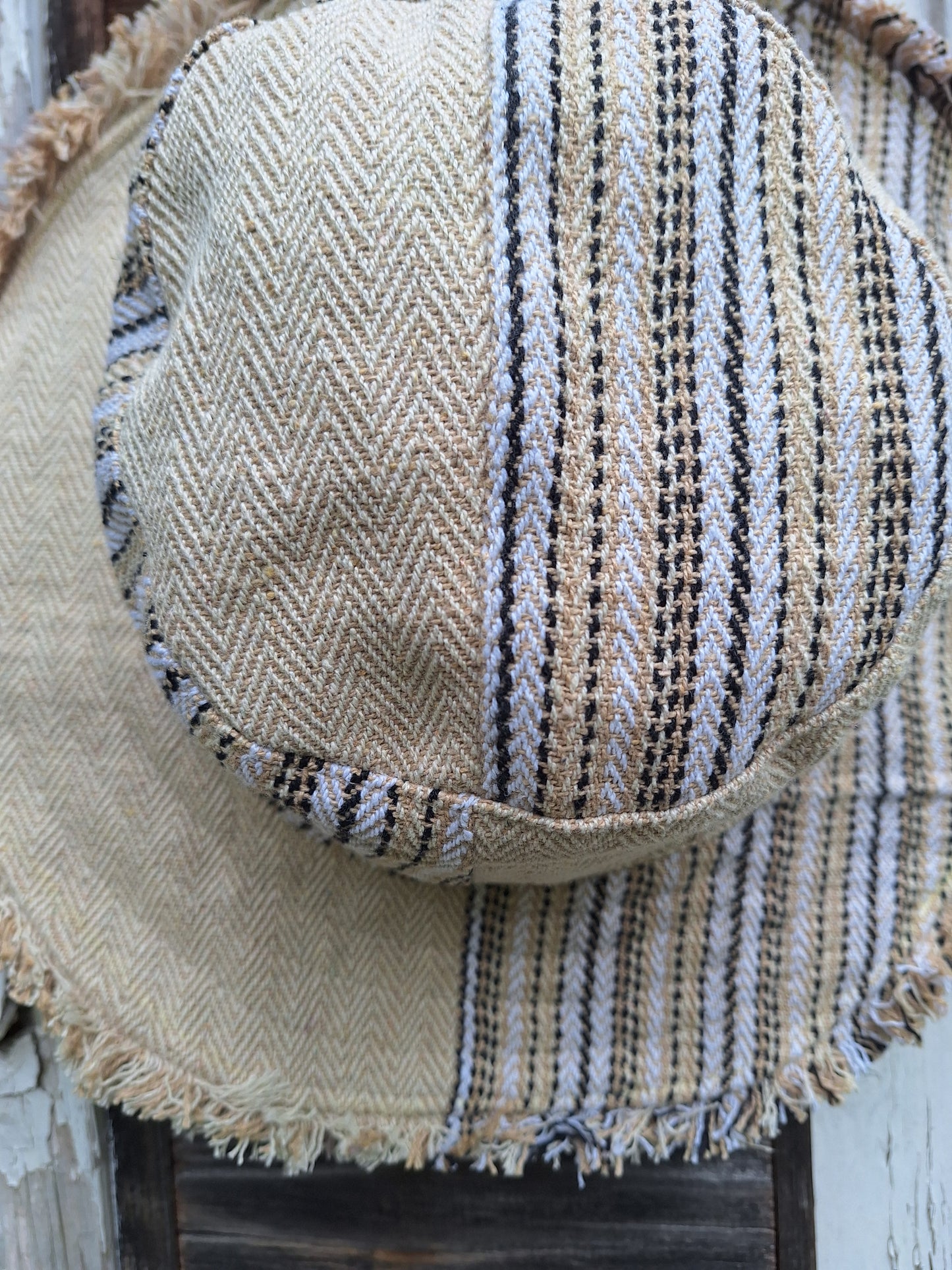 Unisex HERRINGBONE and GHERI OUTBACK CREAM hat with a flexible, fringed and lined brim. Beautiful pure Cotton and Fairtrade.