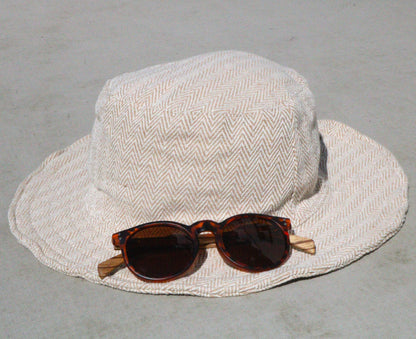 Unisex HERRINGBONE OUTBACK CREAM hat with a flexible, finished and lined brim. Beautiful pure Cotton and Fairtrade.
