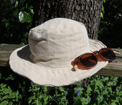Unisex HERRINGBONE OUTBACK CREAM hat with a flexible, finished and lined brim. Beautiful pure Cotton and Fairtrade.
