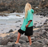 Wave Style Poncho DOS Rocks At The Beach