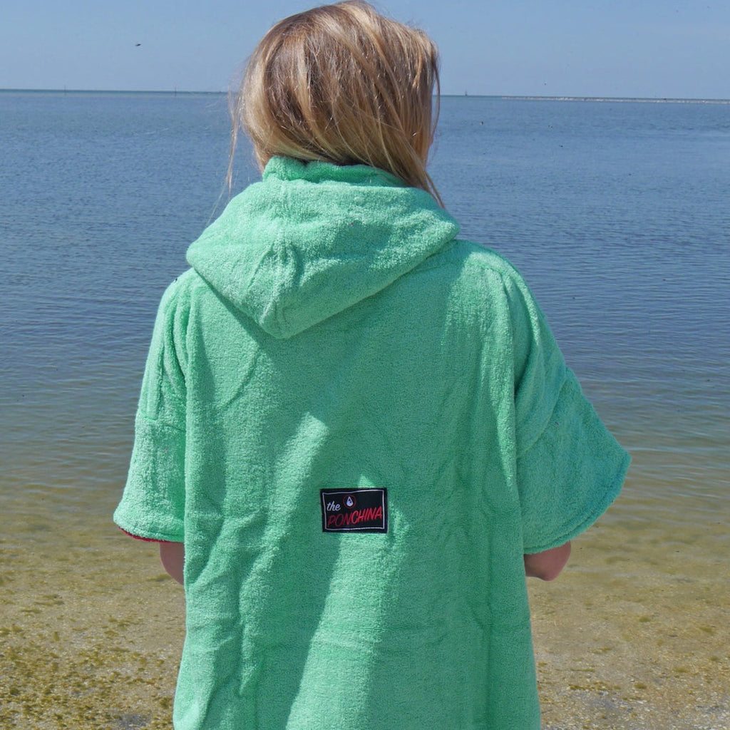 Wave Style Poncho DOS Back View Logo