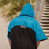 Wave Style Poncho UNO Back View Logo