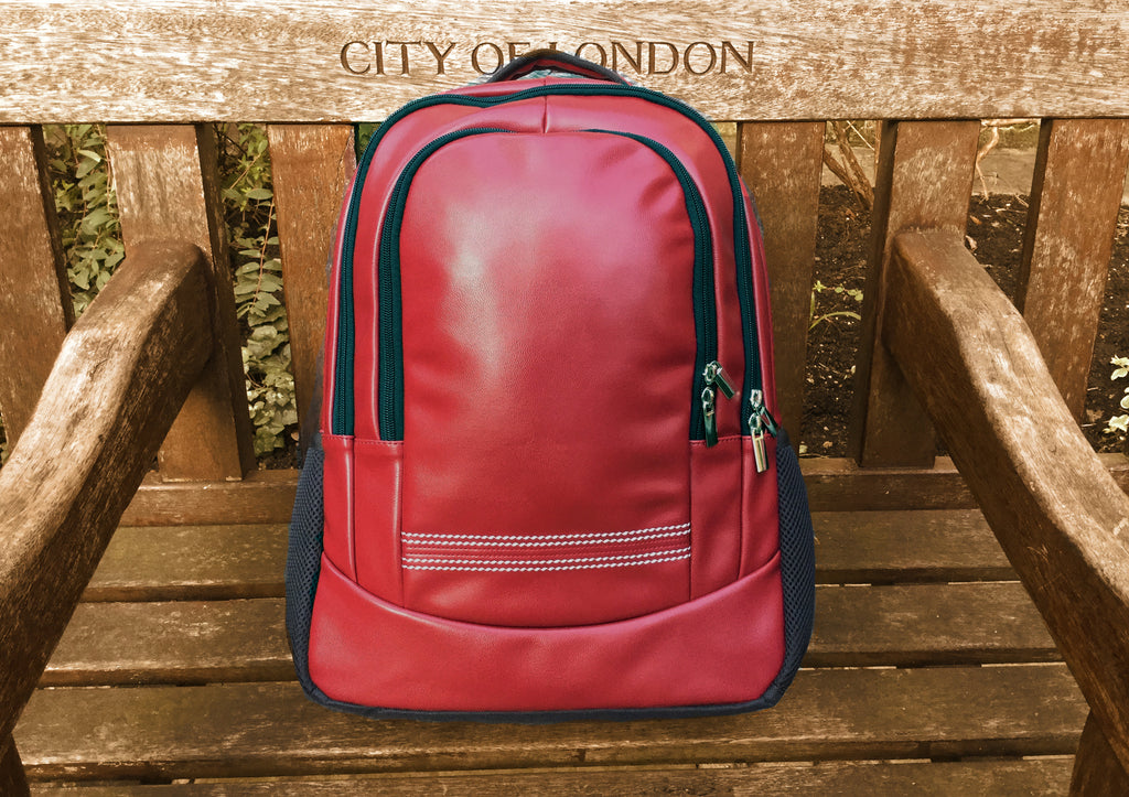 Cricket Red Rucksack 🏏 On a Bench