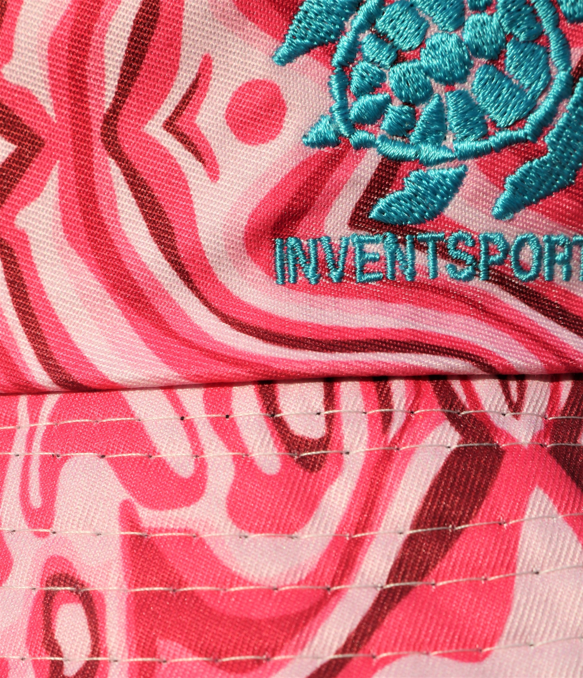 The SONIC FUSCHIA Bucket Hat Logo Closer View