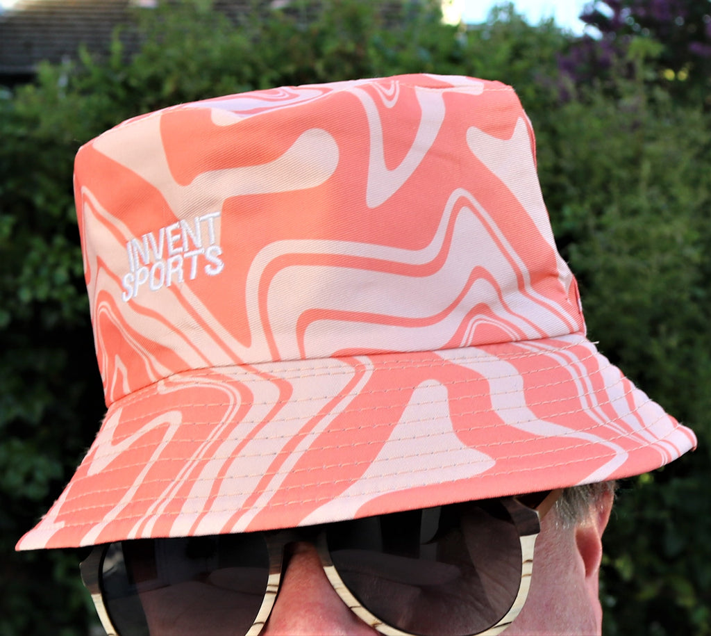 The SONIC PEACH Bucket Hat Close View Of Logo